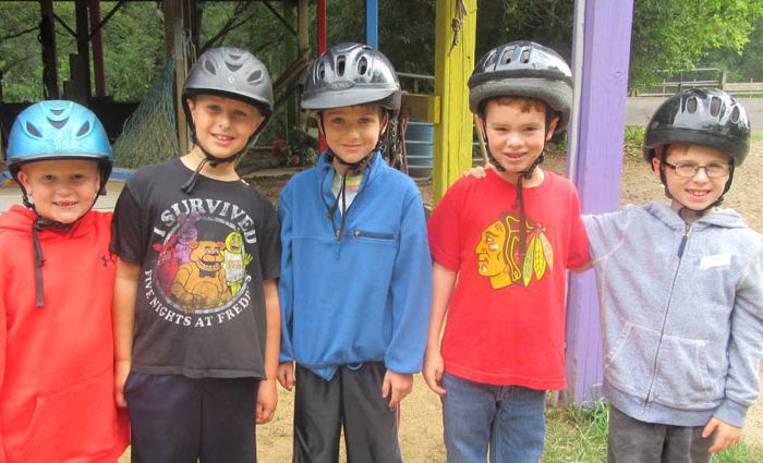 campers wearing helmets