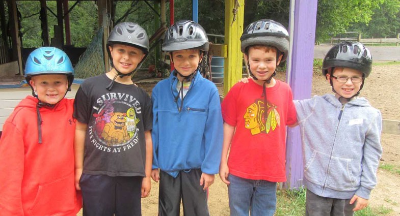 campers wearing helmets
