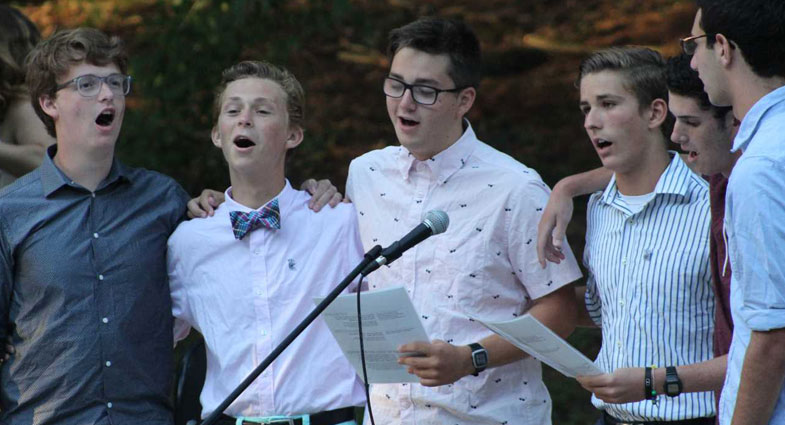 boys singing together