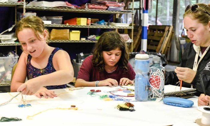 campers making arts and crafts