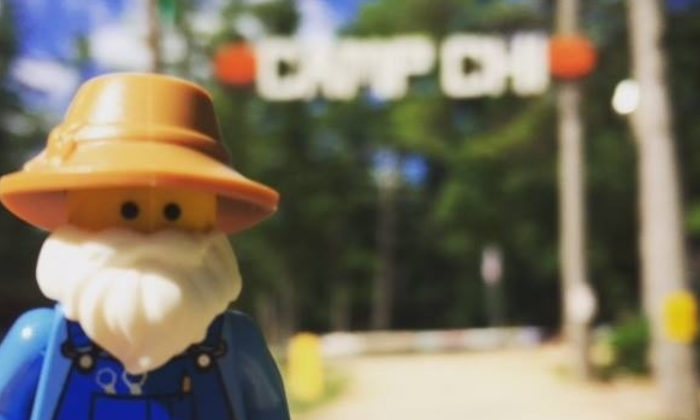 lego figure of winkle in front of camp entrance