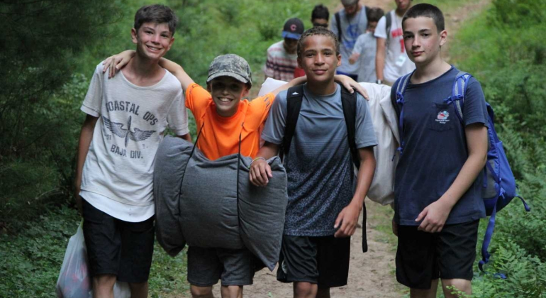 campers with their backpacks