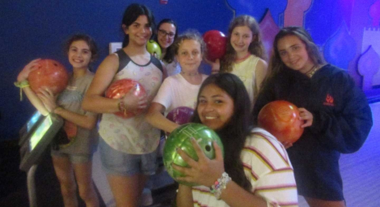 campers posing with bowling balls