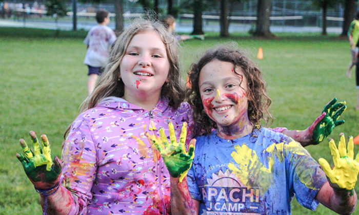 campers covered in paint after a fun evening program