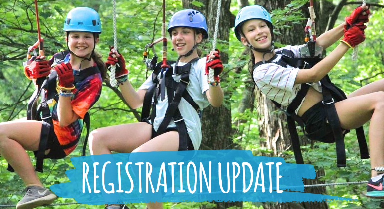 campers smiling on ropes course