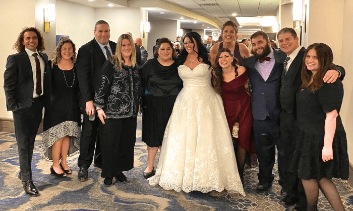 group photo with bride at wedding