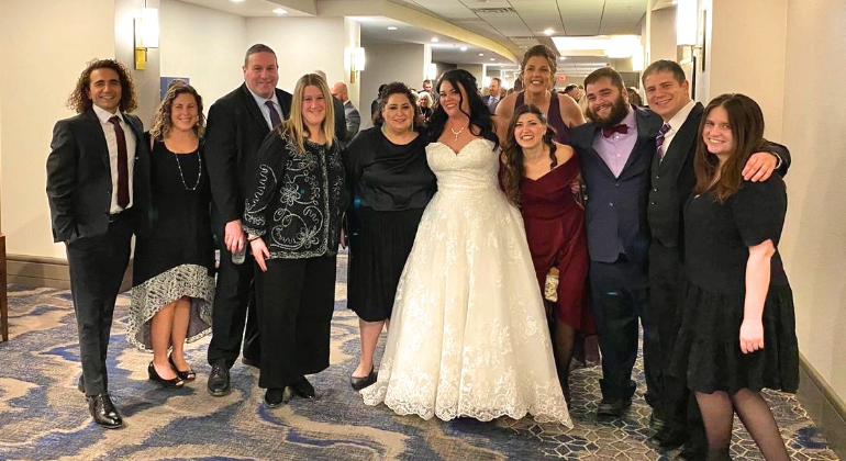 group photo with bride at wedding