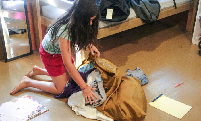 camper packing a bag